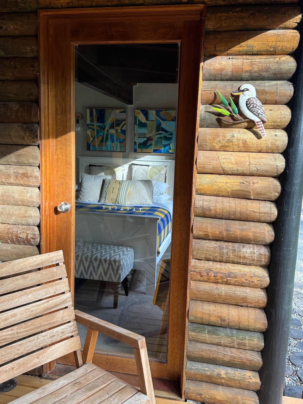 Rustic bedroom interior at Wilder Romp — private filming location Victoria